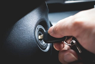 Egham Auto Locksmith With Car Key In ignition