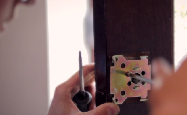 Locksmith Fitting Lock Plate in Ealing
