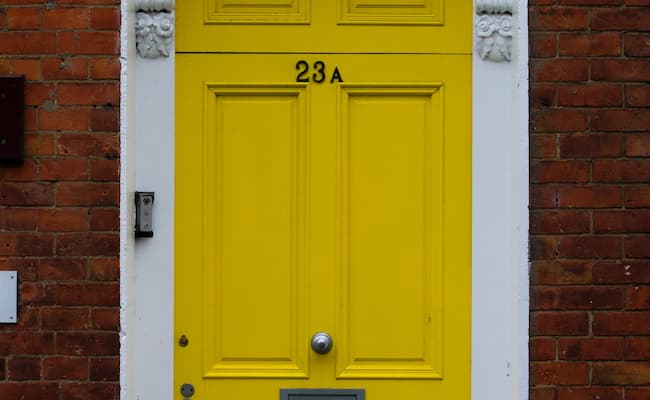 A bright yellow front door.