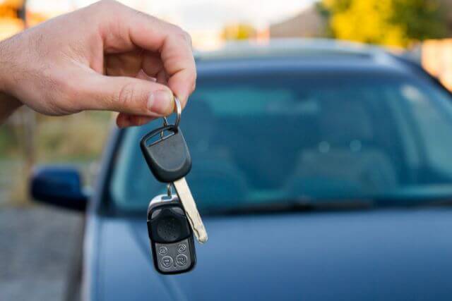 Spare Vehicle Keys in Feltham - Man Holding Car Keys