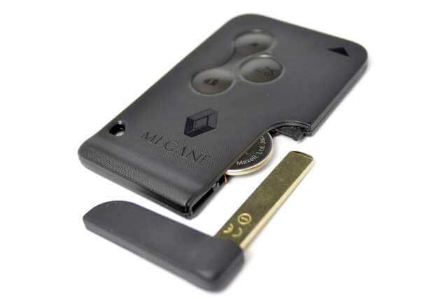 A Renault Megane key card with a new key blade and battery