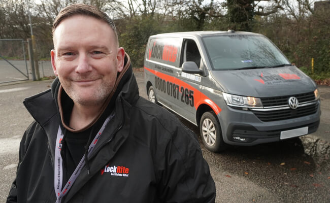 Camborne Locksmith stood in front of LockRite van.