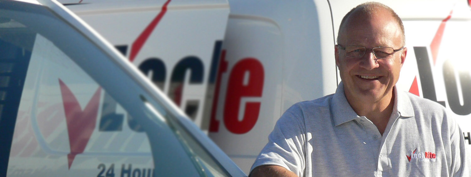 Exminster locksmith stood beside LockRite branded van