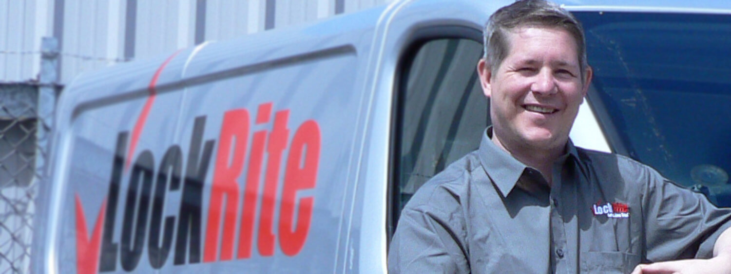 Stony Stratford locksmith stood beside LockRite branded van