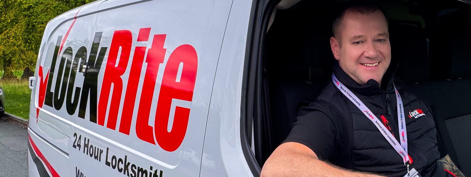Keighley locksmith stood beside LockRite branded van